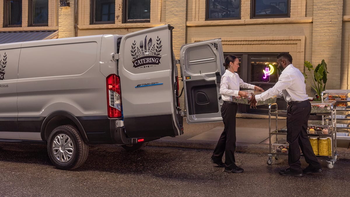 Ford Transit van being used as a food delivery vehicle.